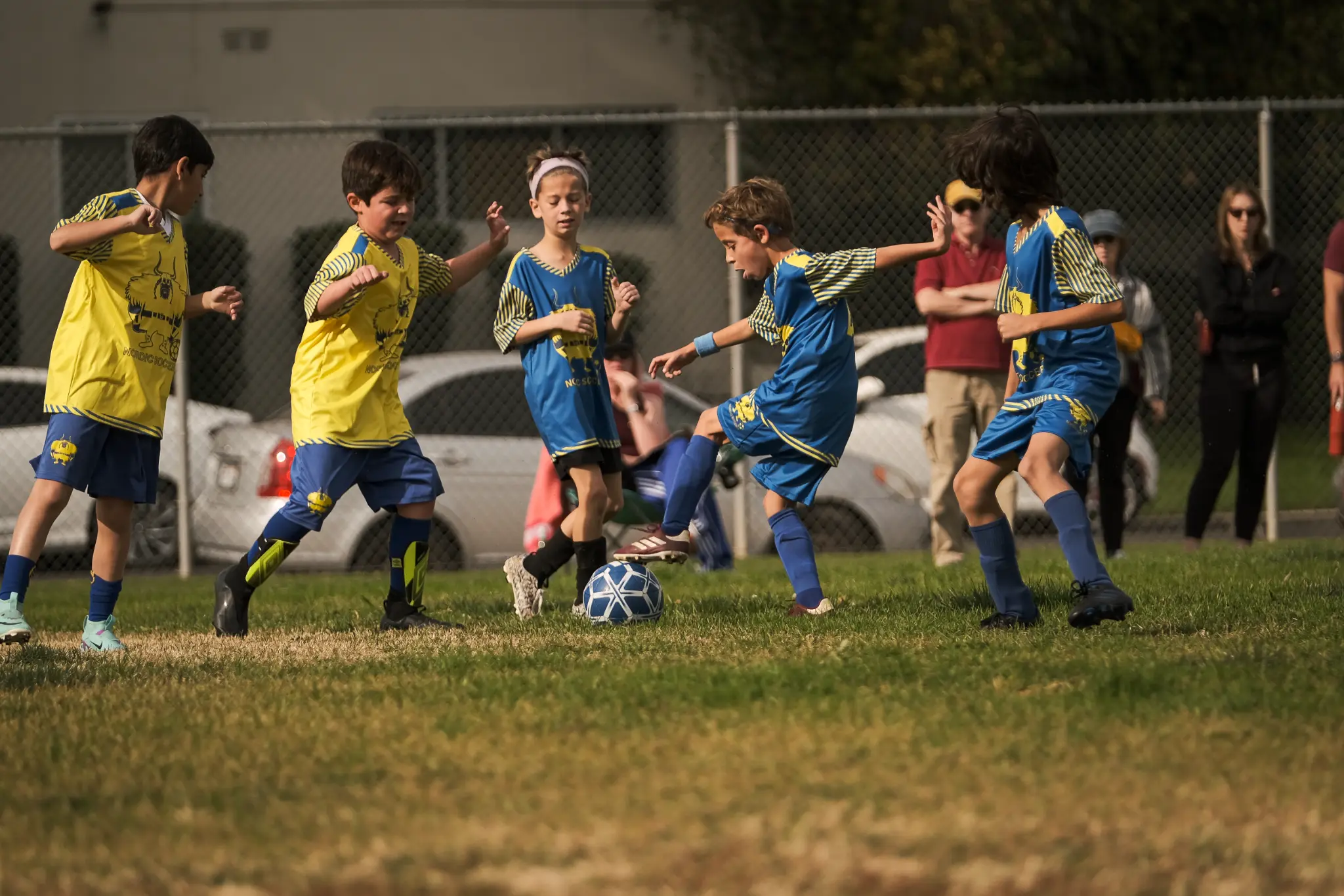 Nordic Soccer team celebration after scoring goal during youth soccer game at Van Nuys Middle School